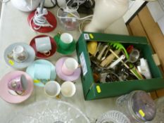 Box of kitchen cutlery and utensils and a harlequin set of coffee cups and saucers