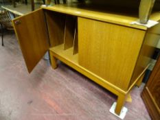Light wood cabinet and a glass entertainment stand