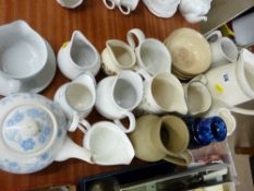 Quantity of ceramic jugs, blue and white decorated teapot etc