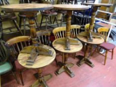 Quantity of pub furniture - six circular topped pedestal tables and six farmhouse style chairs