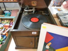 Good HMV wooden encased winding gramophone and a parcel of six LP records