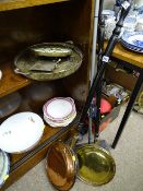Antique copper warming pan with turned handle, an antique brass and copper warming pan with turned