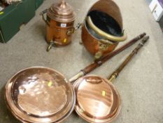 Two antique copper warming pans with turned handles, a small copper helmet coal scuttle and a nice