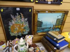 Framed embroidered picture and a framed oil on canvas - street scene