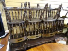 Extending Priory style oak dining table and a set of eight spindleback dining chairs