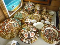Large parcel of modern gilt porcelain Minton teaware and dinner plates in the Crown Derby Imari