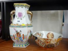 Large twin handled reproduction Oriental vase with elephant handles and a circular pedestal fruit