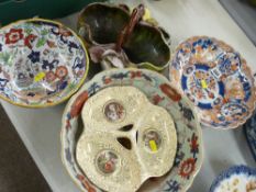 Circular Imari bowl (chipped rim), a Majolica style pottery basket, an Amherst ware bowl and a