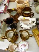 Parcel of eight assorted jugs and a Continental floral lidded pot