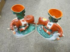 Pair of late 19th Century Staffordshire pottery cow and calf spillholders (areas of damage)