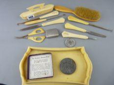 Vintage ivorine manicure set, a Lusitania (German) medal etc