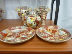 Pair of early 20th Century Satsuma vases on three supports with dragon handles, a pair of small