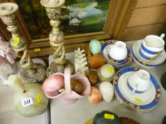 Pair of wooden twist floral candleholders, a parcel of alabaster and other eggs and a part blue