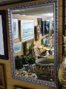 Gilt framed bevelled wall mirror