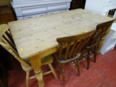 Pine farmhouse table, antique style with end drawer along with three farmhouse style chairs