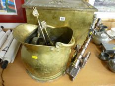 Brass lidded coalbox, brass helmet coal scuttle and a lustre metal cannon on carriage poker and