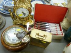Modern gilt framed mantel clock, an oak framed circular aneroid wall barometer, two other small