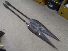 Pair of native wooden spears with carved blades