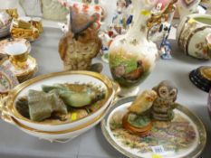 Two oval pheasant patterned tureens and a plate, three owl ornaments and a pottery gilt handled