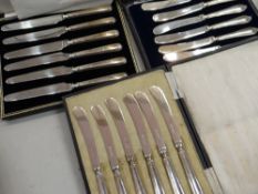 Three cased sets of hallmarked silver handled butter knives