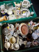 Two crates of mixed china including figurines, teapots, jugs etc