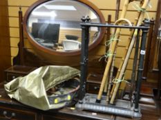 An antique cast iron stick stand & contents