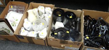 Four boxes of various hotelware items including electric kettles, water filters, place mats etc