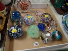 A collection of ornamental paperweights