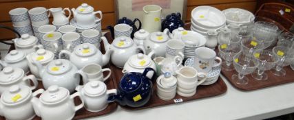 Three trays of various china including pottery teapots, coffee ware, sundae dishes etc