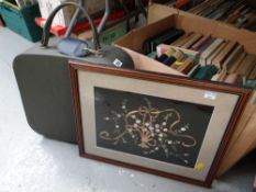 A framed decorative & primitive needlework picture together with a vintage Revelation overnight