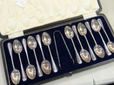 A cased set of twelve hallmarked silver teaspoons together with sugar nips, 6.6 ounces approx.