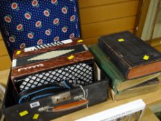 A cased piano accordion plus three vintage books including a Welsh Bible