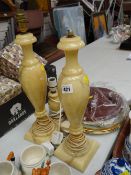 Pair of cream coloured onyx table lamps together with a smaller example & a small parcel of