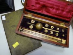 A Sikes hydrometer & reference book