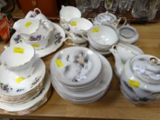 An Oriental eggshell teaset together with a Duchess bone china teaset