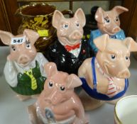 Five Wade Natwest piggies together with a treacle glazed jug
