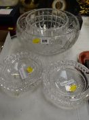 A modern Waterford crystal bowl, two Waterford crystal ashtrays & a large cut glass bowl