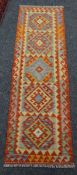 A vegetable dyed wool Choli Kilim runner, 193 x 60cms