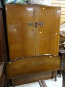 A vintage two-door light wood wardrobe, an Edwardian inlaid dressing table & another together with a