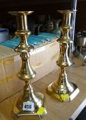A good pair of brass candlesticks
