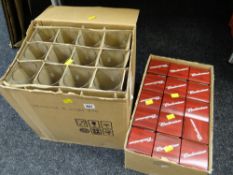 Two boxes containing pint glasses