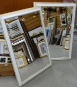 Four modern white painted & gilt framed bevelled wall mirrors
