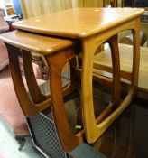 Two graduated matching mid-century coffee tables