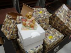 A collection of boxed Cherished teddies resin ornaments