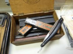Small box containing collection of vintage cut throat razors