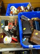 Three boxes of selected items associated with shaving including razors, brushes together with a