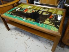 A mid-century glass top pictorial Long John coffee table depicting vintage motorcar & crowds of
