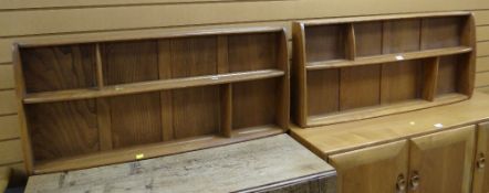 A pair of Ercol hanging plate racks