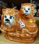 A pair of Staffordshire lions