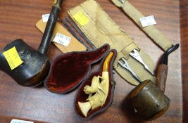 Cased miniature Meerschaum pipe, two other pipes, collection of tuning forks
